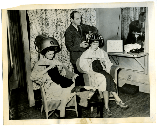"Knitting for the forces at the beauty salon, London, 1940.”