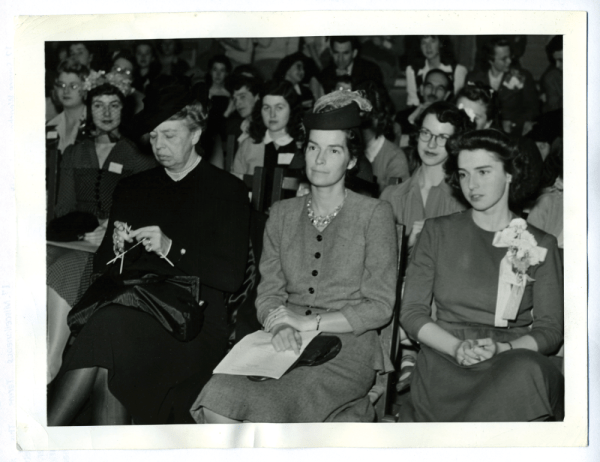 "First Lady Eleanor Roosevelt knits while attending 'We’re in the Army Now,' a conference held at Vassar College in Poughkeepsie, New York, 1941."
