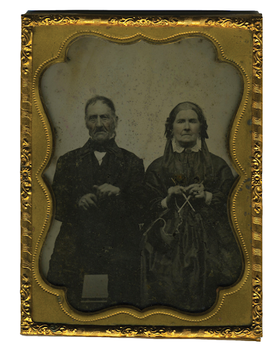 "Ambrotype, ca. 1860, of a married couple. The wife is pictured with her knitting to show she is a woman of character and virtue."